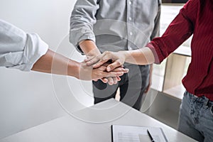 Image of business people joining and putting hands together during their meeting, connection and collaboration concept, Teamwork