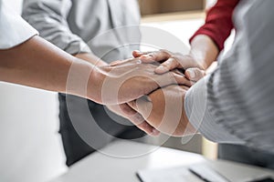 Image of business people joining and putting hands together during their meeting, connection and collaboration concept, Teamwork