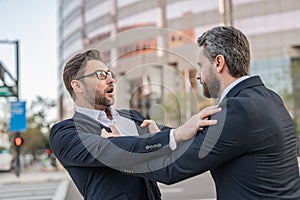 image of businessmen have business conflict. businessmen have business conflict.