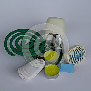 image of candles, mosquito repellers and insecticides. Protection from insects and mosquitoes in anticipation of summer.