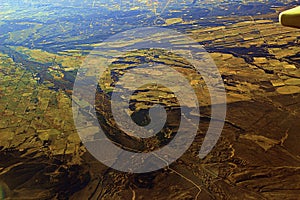 Image captured from a window of a commercial airplane while flying over western United States