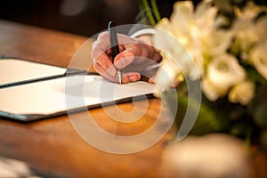 Nuptial Promise: Signing the Wedding Register