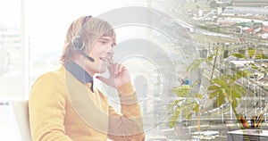 Image of caucasian businessman on phone over cityscape photo