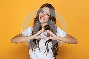 Image of charming woman 20s with long hair smiling and showing h