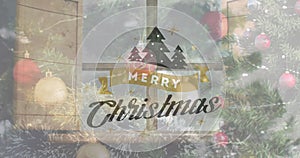 Image of christmas greetings text over christmas tree and decorations