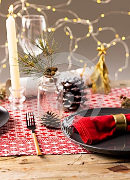 Image of christmas place setting with christmas decoration on wooden background