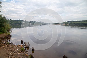 Image of the city on the river in cloudy day