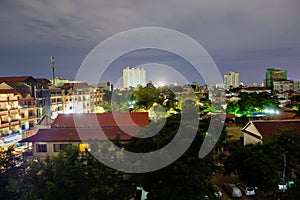 Image of cityscape at night. Urban buildings