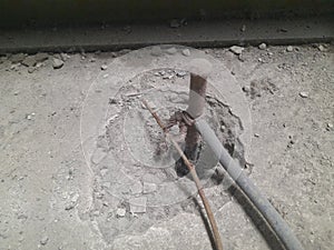 image of clamp used to neutralize negative flow underground photo