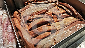 close up stack of the fish rue on the tray.