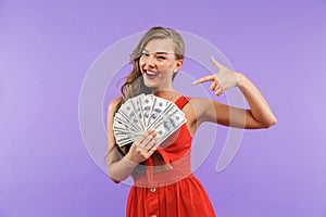 Image closeup of delighted woman 20s wearing red dress smiling a