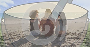 Image of coffee cup against rear view of diverse three women sitting together at the beach