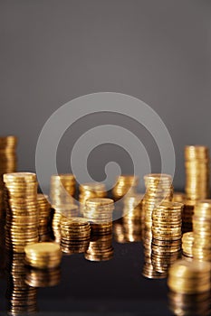 Image of coins stacks. Shallow depth of field photo