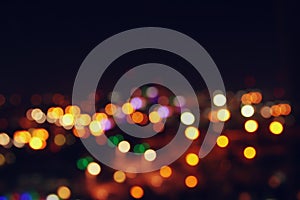 Image of colorful blurred defocused bokeh Lights. motion and nightlife concept