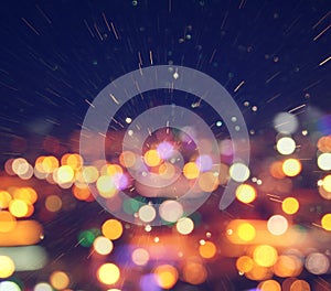 image of colorful blurred defocused bokeh Lights. motion and nightlife concept