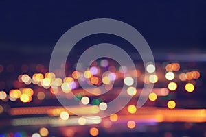 image of colorful blurred defocused bokeh Lights. motion and nightlife concept