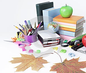 Image of colorful school supplies on white background