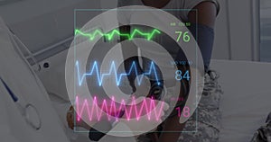 Image of colourful cardiographs over happy diverse patient and doctor taking pressure photo