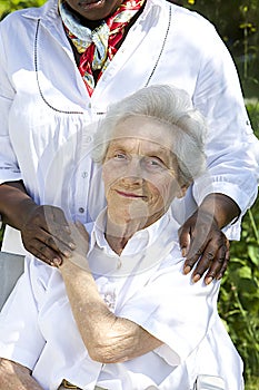 Image of comfort and support from a care giver to the Senior