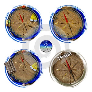 Image of a compass on sand.
