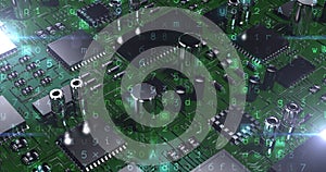 Image of computer circuit board elements and binary coding over green background