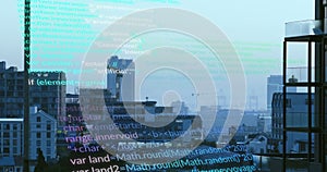 Image of computer language over modern buildings in background