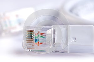 An image of computer network cable on white background