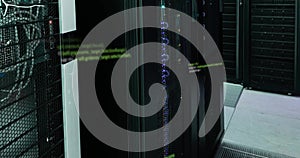 Image of computer programming language over data server room