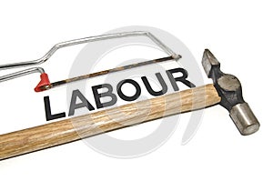 Image concept old and dirt cropped hammer with mini handsaw placed on top word labour