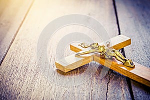 image of crucifix of Jesus Christ on wooden background,