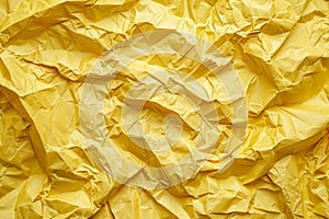 Image of Crumpled sheet of yellow paper. Texture for background usage