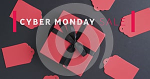 Image of cyber monday sale text over gift tags and boxes