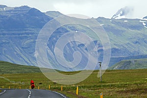 Image of cyclist along the coast of iceland