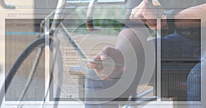 Image of data processing on computer screens over man using smartphone
