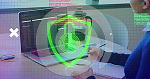 Image of data processing and globe over caucasian businesswoman using laptop