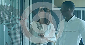 Image of data processing and globe over diverse business people