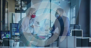 Image of data processing over businessman using tablet