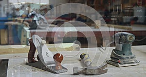 Image of data processing over carpentry tools in workshop