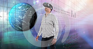 Image of data processing over caucasian man using vr headset