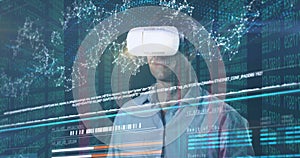 Image of data processing over caucasian man with vr headset