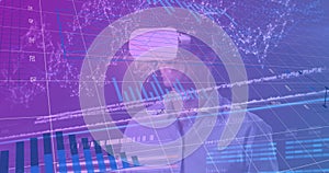 Image of data processing over caucasian man with vr headset