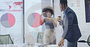 Image of data processing over diverse business people working at office