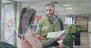 Image of data processing over diverse business people working at office