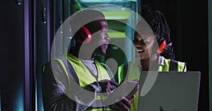 Image of data processing over diverse it engineers and computer servers