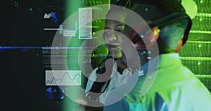 Image of data processing over diverse it engineers by computer servers