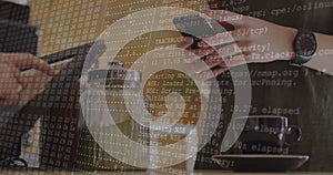 Image of data processing over hands using smartphone in cafe