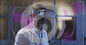 Image of data processing over man using vr headset
