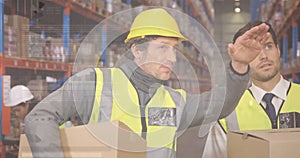 Image of data processing over people working in warehouse