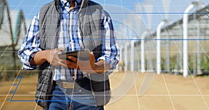 Image of data processing and statistics over biracial engineer using tablet