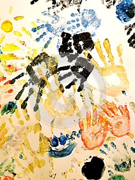 Conceptual texture background of some colorful handprints